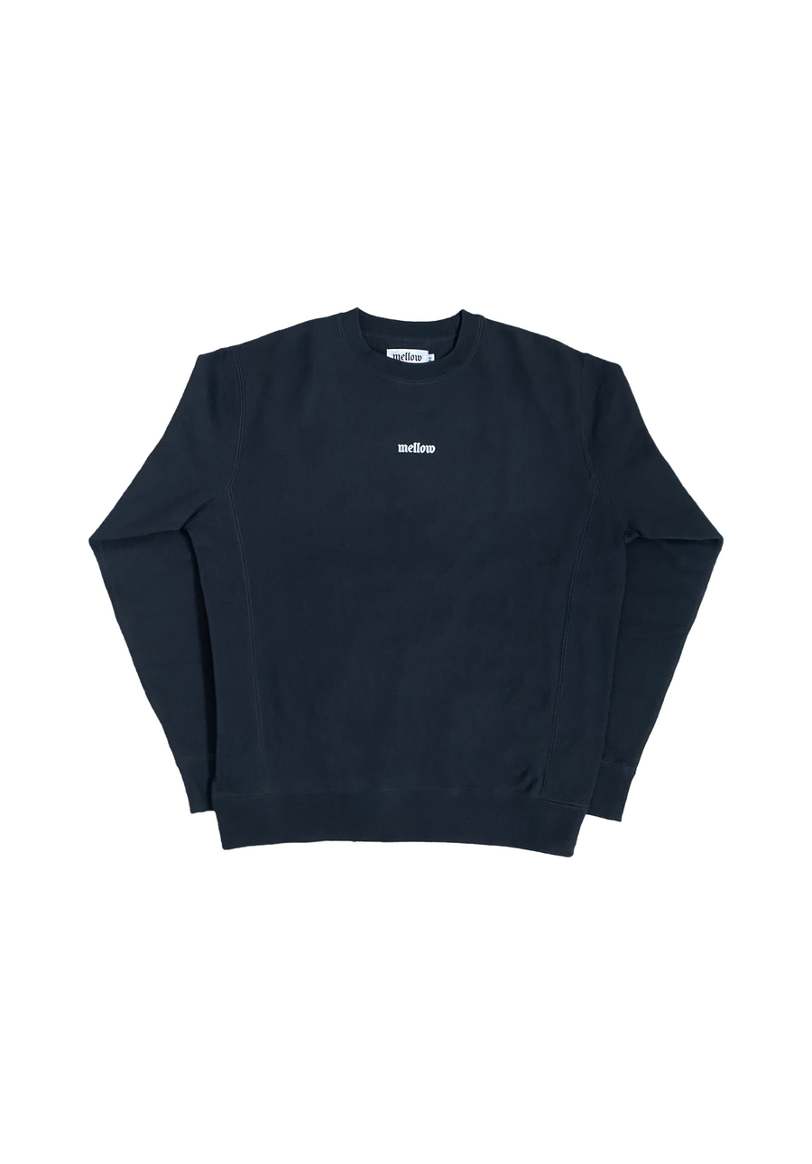 Mellow black crewneck sweatshirt with embroidered 'mellow' logo on chest, long sleeves, and relaxed fit. 100% COTTON MADE IN USA