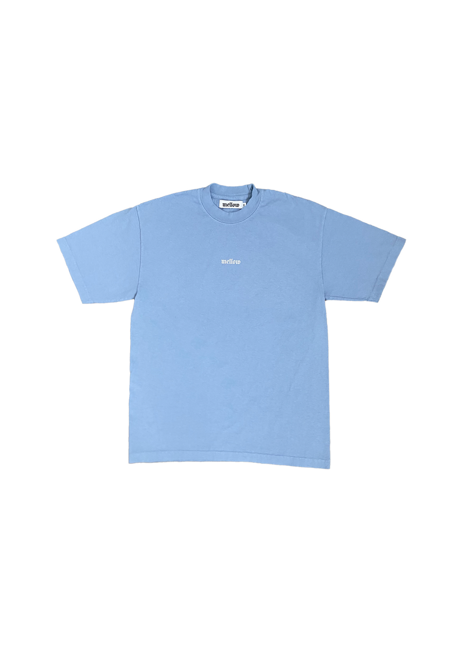 Mellow light blue jersey short sleeve t-shirt with embroidered 'mellow' logo on chest, short sleeves, and relaxed fit. 100% COTTON MADE IN USA