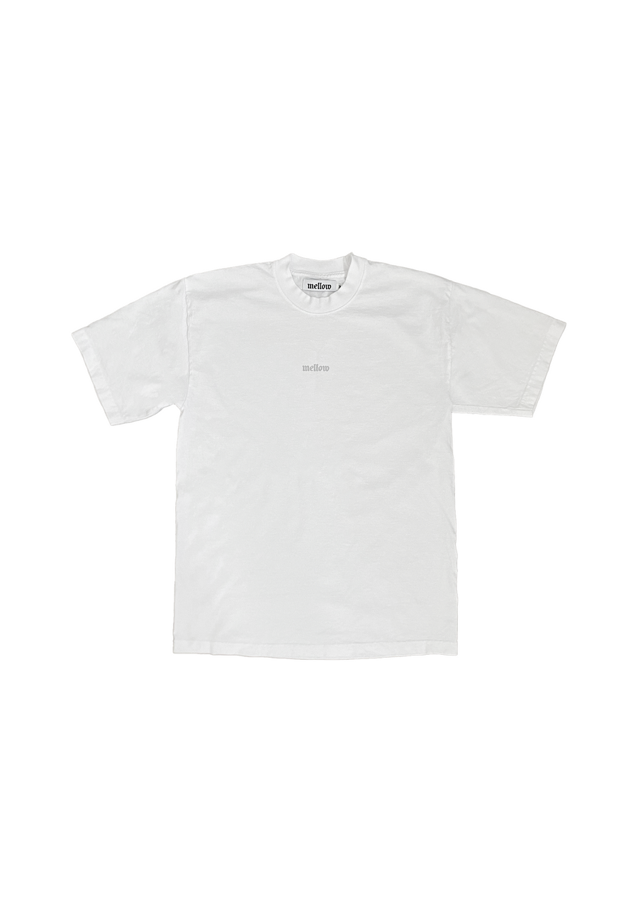 Mellow white jersey short sleeve t-shirt with embroidered 'mellow' logo on chest, short sleeves, and relaxed fit. 100% COTTON MADE IN USA